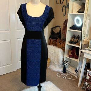 Bebe Bodycon Dress in a size Large EUC has been Dry cleaned